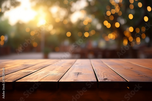 empty wooden table with blur tree © Fazlul