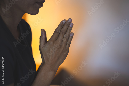 Hands folded in prayer concept for faith, Religious young woman praying to God in the morning, spirtuality and religion, Religious concepts.
