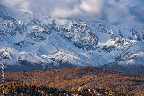 Mountains covered with snow during sunrise. Mountain landscape.