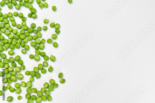 fresh green peas on a white background.