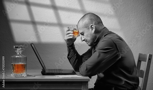 Quadro em tela Drinking whiskey at work, depression