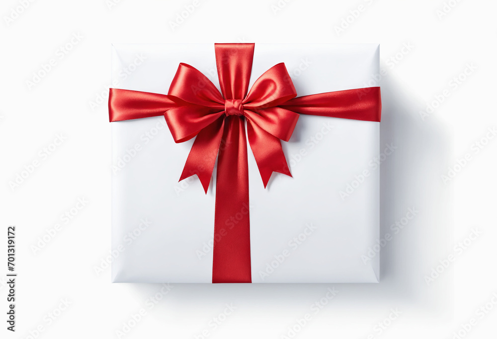 White paper card with gift red satin bow.