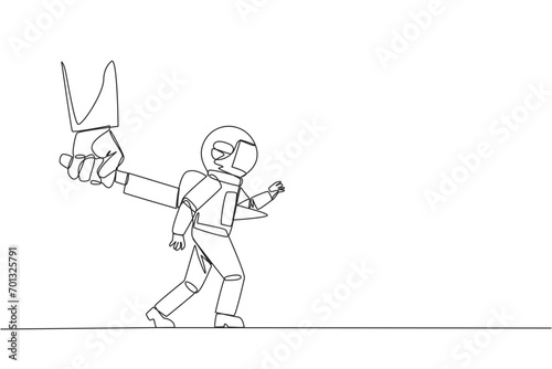 Single continuous line drawing astronaut stabbed in the back by a large knife. Cheated to ruin by a business partner. An enemy disguised as a friend. The traitor. One line design vector illustration