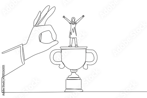 Single one line drawing Arabian businesswoman standing on big trophy. Celebrating success of business. Got fraudulent business opponents. Falling helpless. Continuous line design graphic illustration