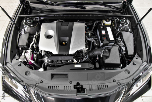 The engine compartment of a passenger car.