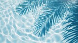 palm leaf shadow on blue water waves, vacation and beauty care with copy space