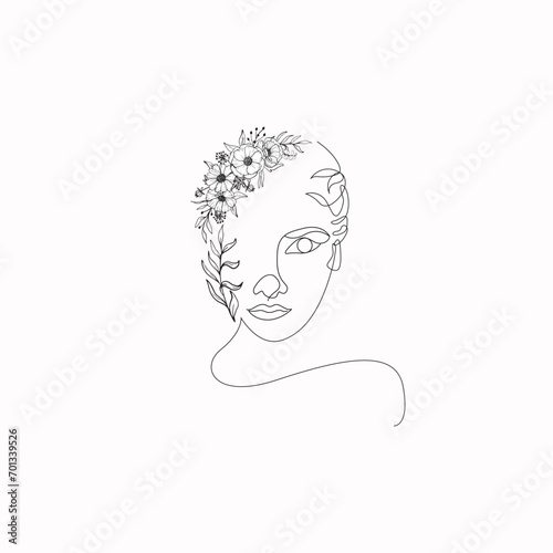 Beautiful woman with flowers in her hair. One line drawing line art floral lady line art