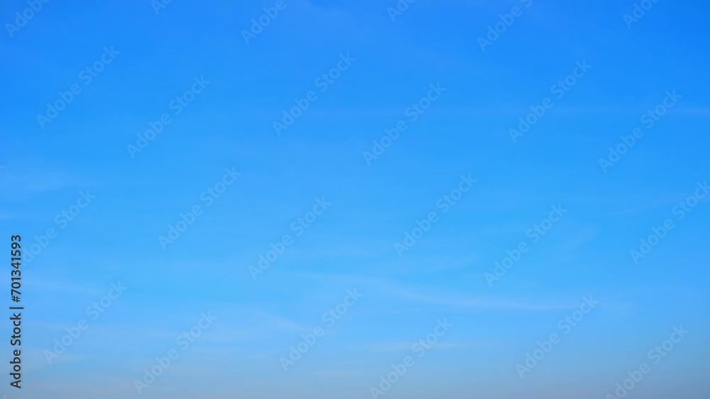 Blue sky timelapse, Vivid streaks of azure race overhead as fluffy clouds dance in a mesmerizing ballet, in this exhilarating time-lapse of a brilliant blue sky. Nature concept.
Blue sky timelapse, Vivid streaks of azure race overhead as fluffy clouds dance in a mesmerizing ballet, in this exhilarating time-lapse of a brilliant blue sky. Nature concept.