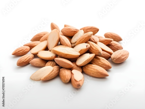 Heap of peeled almond on isolated white background