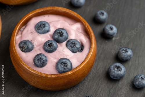 fresh blueberry-flavored yogurt with ripe blueberries