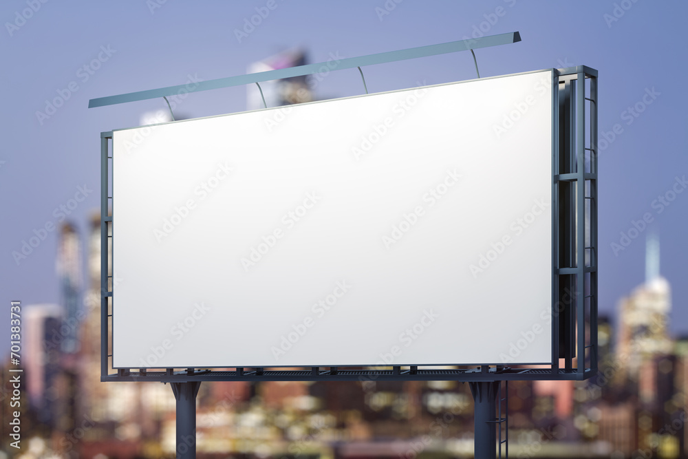 Blank white billboard on city buildings background at night, perspective view. Mockup, advertising concept - obrazy, fototapety, plakaty 