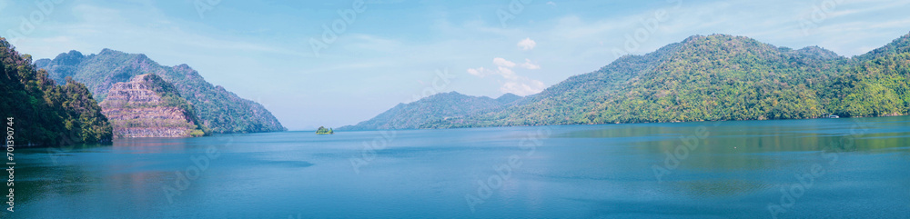 Islands with mountains, blue sky, clouds and water. Landscape with water and green forest. Panorama view in vajiralongkorn dam , Kanchanaburi Province,Thailand