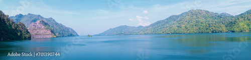 Islands with mountains, blue sky, clouds and water. Landscape with water and green forest. Panorama view in vajiralongkorn dam , Kanchanaburi Province,Thailand