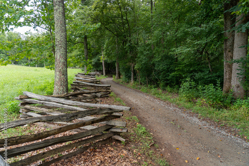 Plantation loop trail at Booker T. Washington National Monument in rural Virginia. Tobacco farm where Booker T. Washington was born into slavery and later freed by the Emancipation Proclamation. Plantation loop trail at Booker T. Washington National Monument in rural Virginia. Tobacco farm where Booker T. Washington was born into slavery and later freed by the Emancipation Proclamation.