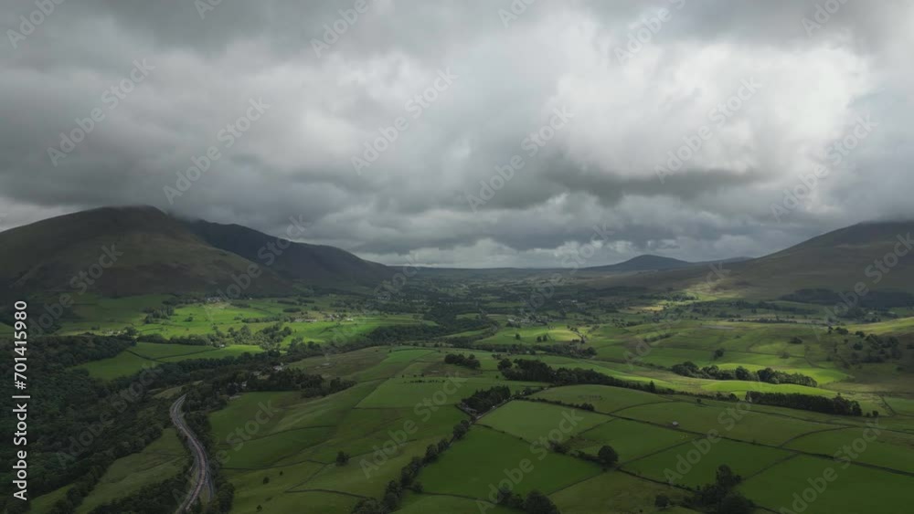 Aerial drone view of the green farmlands and hills. Aerial drone view of the green farmlands and hills.