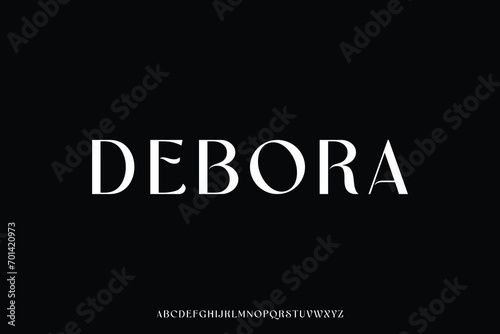 Curvy elegant feminine decorative alphabet display font vector photo