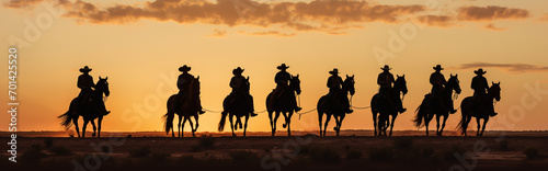 Panorama view of 8 cowboys riding a horse with sunset background  only silhouette visible. Generative AI