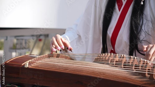 playing the guzheng photo