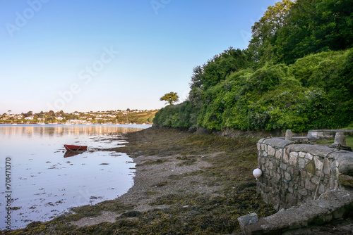 Trewince Quay at the mouth of Porth Creek, with the Percuil River and St. Mawes beyond: Roseland Peninsula, Cornwall, UK