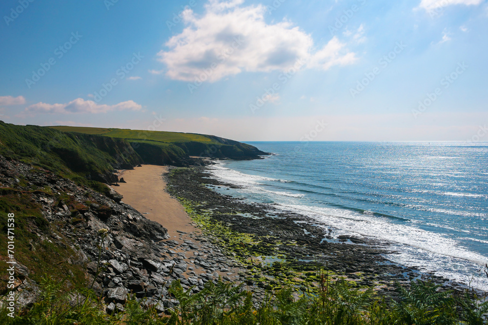 The South-West Coast Path above Porthbeor Beach on the Roseland Peninsula, Cornwall, UK