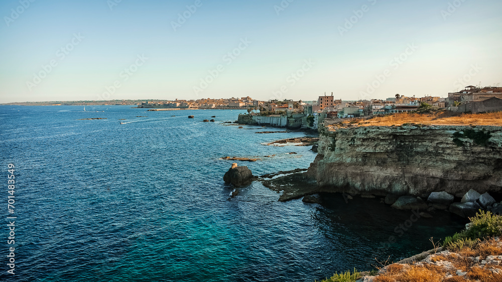 the rocky coast of Syracuse and its beautiful coves