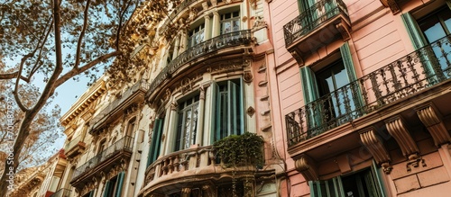 The pastel colored facade of a building in Barcelona adds a touch of charm and elegance to the city s architectural landscape. Creative Banner. Copyspace image