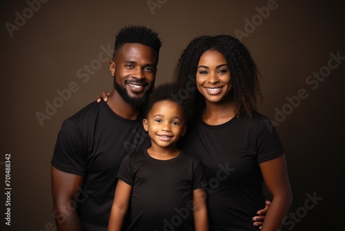 happy young african american family in black t-shirts holding hands mockup isolated on white