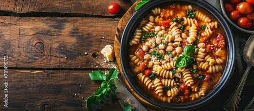 Traditional Italian dish pasta with borlotti bean broth Tasty pasta and bean soup. Creative Banner. Copyspace image photo