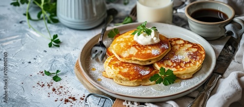 Potato pancakes with sour cream on white. Creative Banner. Copyspace image