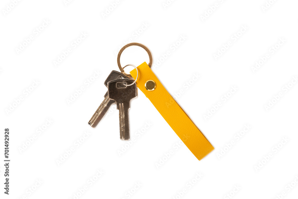Leather keychain with key ring isolated on white background. Concepts for real estate and moving home or renting property. Buying a property. Mock-up keychain.Copy space. Leather keychain with key ring isolated on white background. Concepts for real estate and moving home or renting property. Buying a property. Mock-up keychain.Copy space.