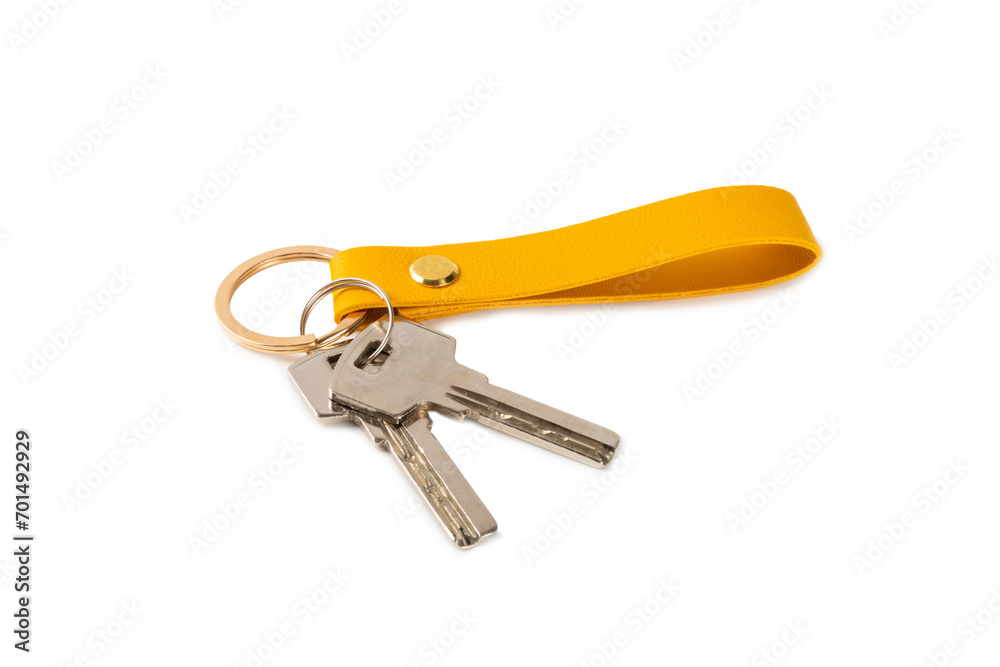 Leather keychain with key ring isolated on white background. Concepts for real estate and moving home or renting property. Buying a property. Mock-up keychain.Copy space. Leather keychain with key ring isolated on white background. Concepts for real estate and moving home or renting property. Buying a property. Mock-up keychain.Copy space.