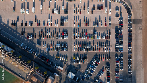 Parking photography. Aerial view of the car parking in a shopping center. Cars online.