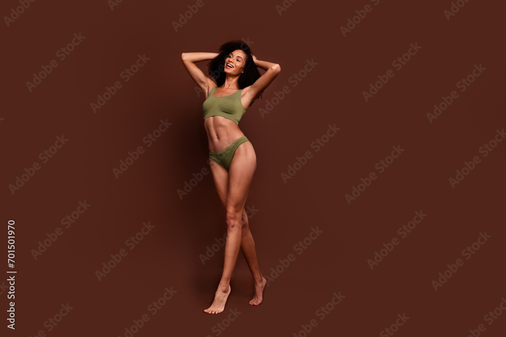 Full length no filter studio photo of shiny pretty woman wear lingerie accepting scars skin empty space isolated brown color background