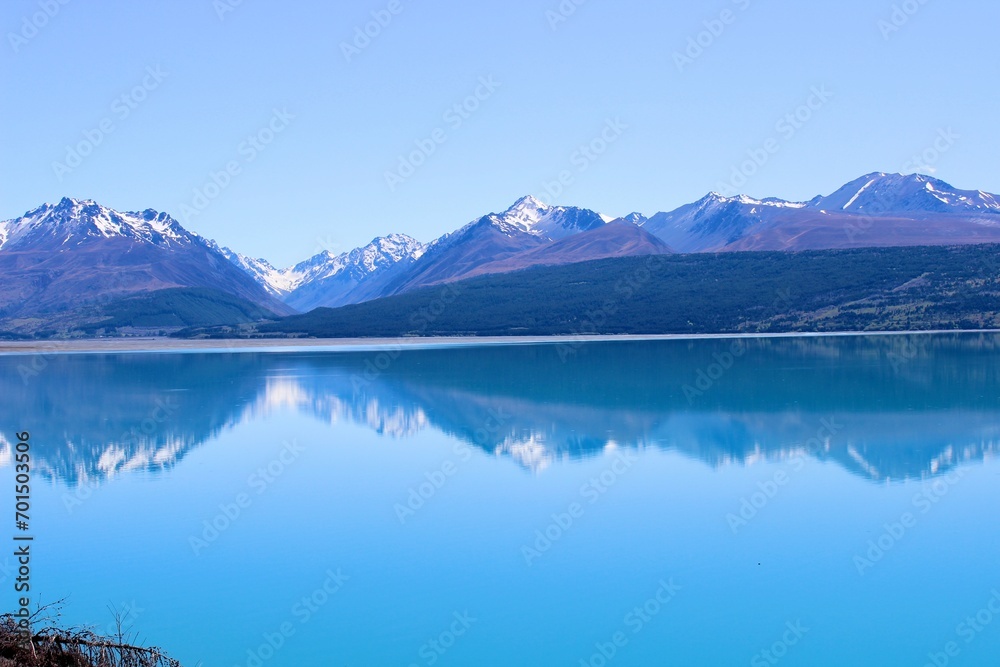 New zealand mirror lake blue and mountains in the back 