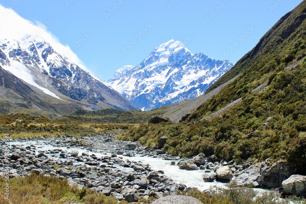 New zealand Mountains with snow and river in front