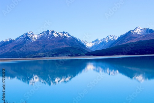 New zealand mirror lake blue and mountains in the back 