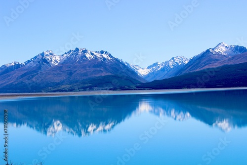 New zealand mirror lake blue and mountains in the back 