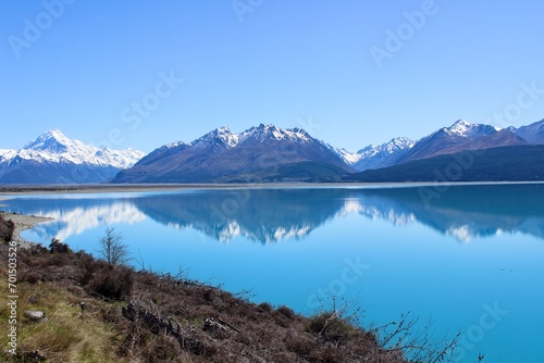 New zealand mirror lake blue and mountains in the back