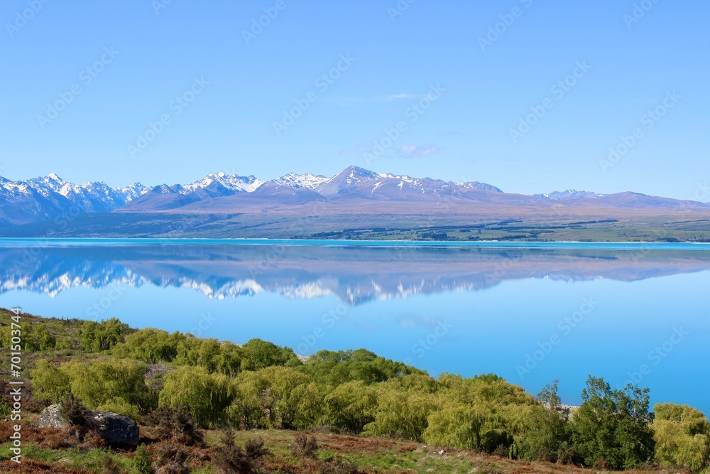 New Zealand mirror Lake mountains with snow