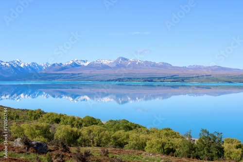 New Zealand mirror Lake mountains with snow