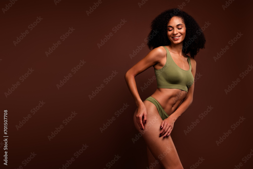 No filter studio photo of pretty sweet woman wear lingerie accepting imperfect skin empty space isolated brown color background