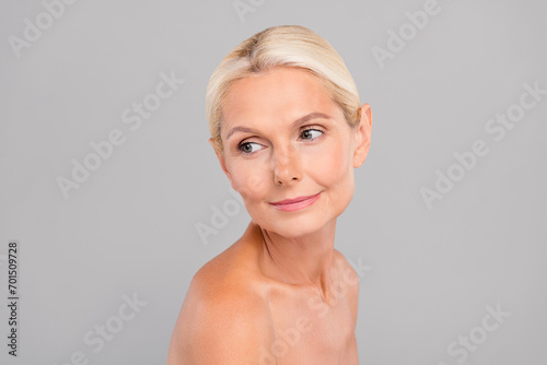 Portrait of attractive adorable smiling lady perfect ideal fresh skin look empty space natural cosmetics isolated on gray color background