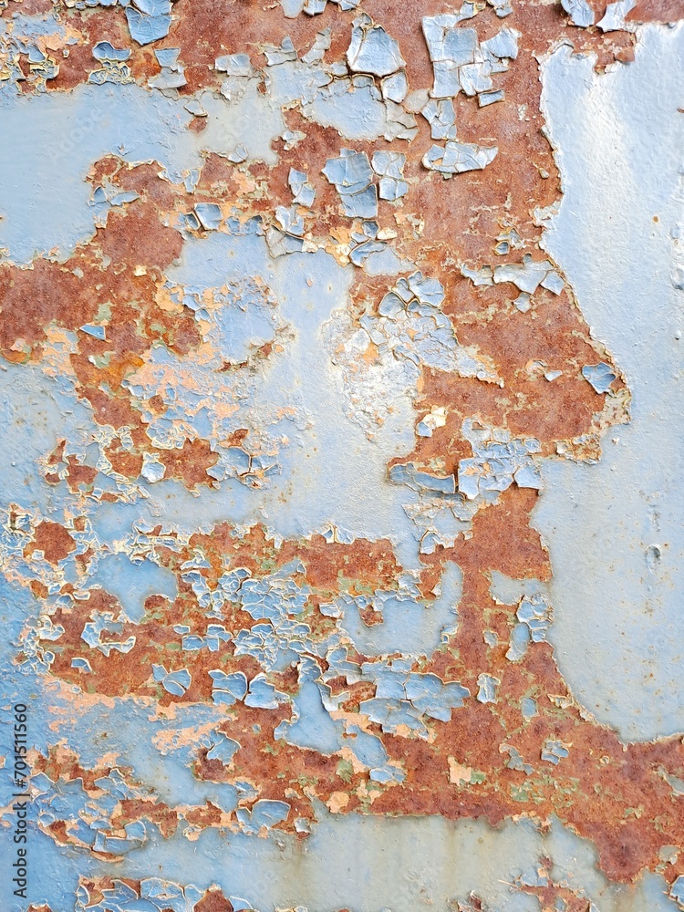 Blue painted Rusty metal door texture background 