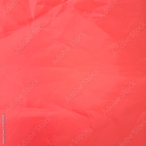 Crumpled red gift paper Texture background 