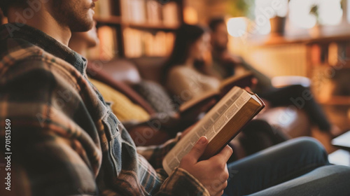 A couple reading the Bible together in their home, Bible, blurred background, with copy space