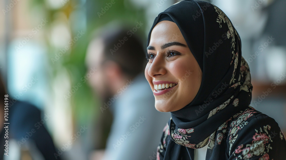 Muslim Business Woman in Hijab at Job Interview, Smiling Candidly in Office, Middle Eastern Professional Setting, Corporate Diversity and Inclusion