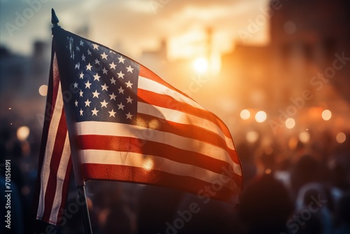 American flag in urban sunset scene, commemorating Memorial Day with blurred background