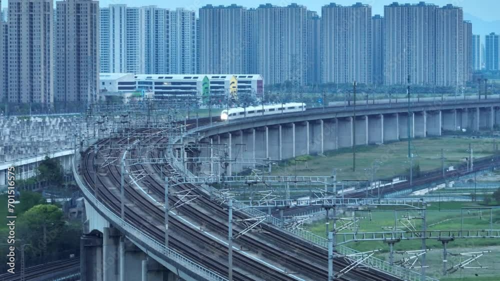 high speed train running on elevated railtrack high speed train running on elevated railtrack
