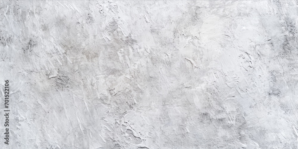 A textured white plaster wall with abstract patterns and brush strokes.
