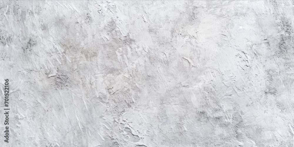 Naklejka premium A textured white plaster wall with abstract patterns and brush strokes.